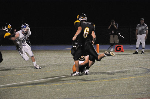 Nick Visco kicking for Archbishop Wood.