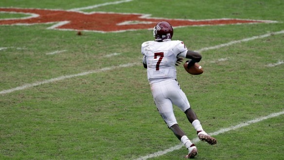 Click on the photo of Chester Stewart rolling out and completely one of many ridiculously easy  5-yard rollout passes to Evan Rodriguez and imagine P.J. opening things up at PSU with the same type of passes to Colin Thompson.