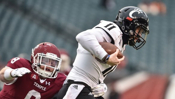 Click on the photo of Tyler Matakevich sacking Shane Carden.